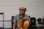 Meet cello faculty, Mark Eeles. Mark has been playing cello for 56 years, and started when he was 11 years old in a Suzuki strings program in Calgary with Thomas Rolston. He began on piano, but once he discovered the sound of the cello, it took over. When he was 18, he went to Julliard and got his Bachelor of Music under the instruction of Harvey Shapiro. After his time there, he pursued an education at the University of Alberta with Claude Kenneson where he restarted his Suzuki journey. Mark has been teaching at the Society for Talent Education since 1980.

His main teachers were Harvey Shapiro and Claude Kenneson, both of whom had connections to a famous violinist and pedagogue Demetrius Constantine Dounis, a contemporary of Shinichi Suzuki. 

“Since my two main teachers all had connections to Dounis is kind of interesting, as my work as a teacher has been to take what both [Shapiro and Kenneson] said and apply it to the Suzuki method. Their philosophy of playing fits naturally into the Suzuki philosophy. I boil down what I think the Suzuki method is to: Train the ear and the body will follow, train the gestures and the music will come alive, one interval at a time."

In Mark’s studio, Suzuki Volume 1 - 3 is about “training the ear and the body will follow”, and Volume 4 and above is more about training the exact gestures that the ears guide. 

“We want to make sure that what we hear and what we feel, is one. ‘Mother tongue’ is about hearing the music and learning it on the basis of how it sounds, [and] the ear is always what generates the movement.” 

Read more from this interview on our website https://ste-suzukistrings.org/interview-with-mark-eeles/